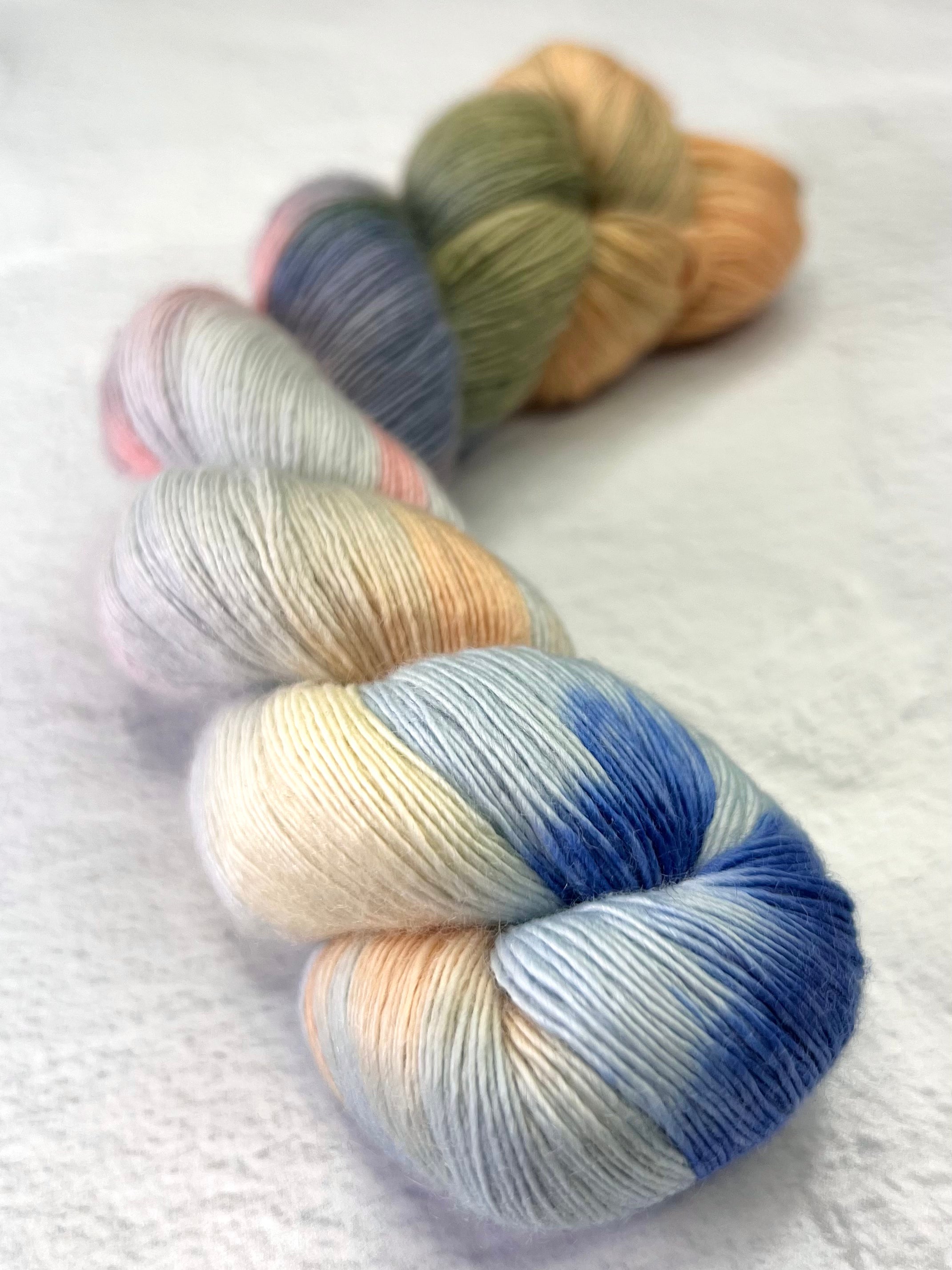Artyarns Cashmere 5 yarn in Hudson Valley and Painters colorways, showcasing soft, luxurious cashmere fibers for knitting or crochet projects.