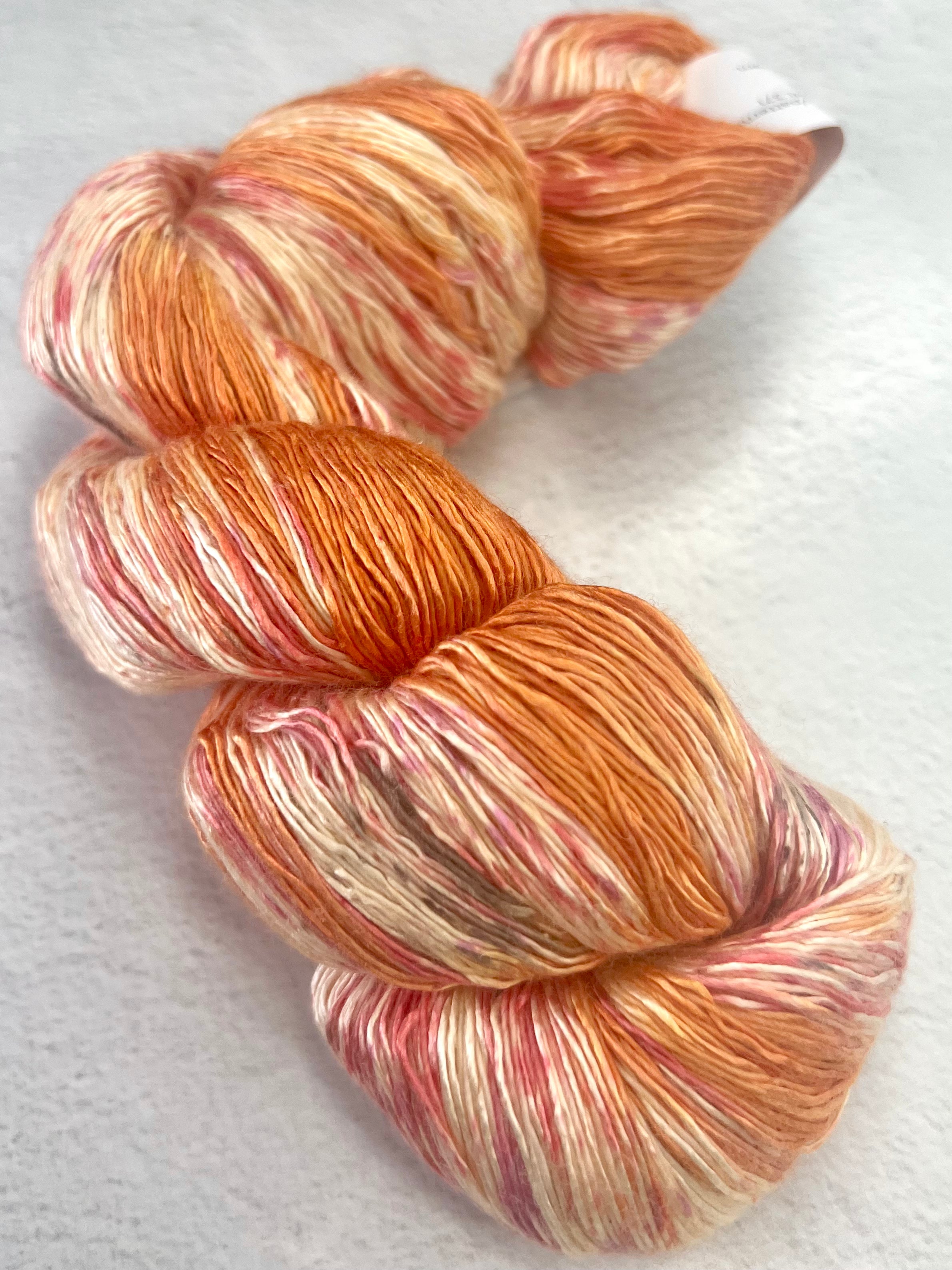 Artyarns Ensemble Light yarn in Cosmic Colors from the H Series, showcasing vibrant, colorful skeins of soft, high-quality yarn.
