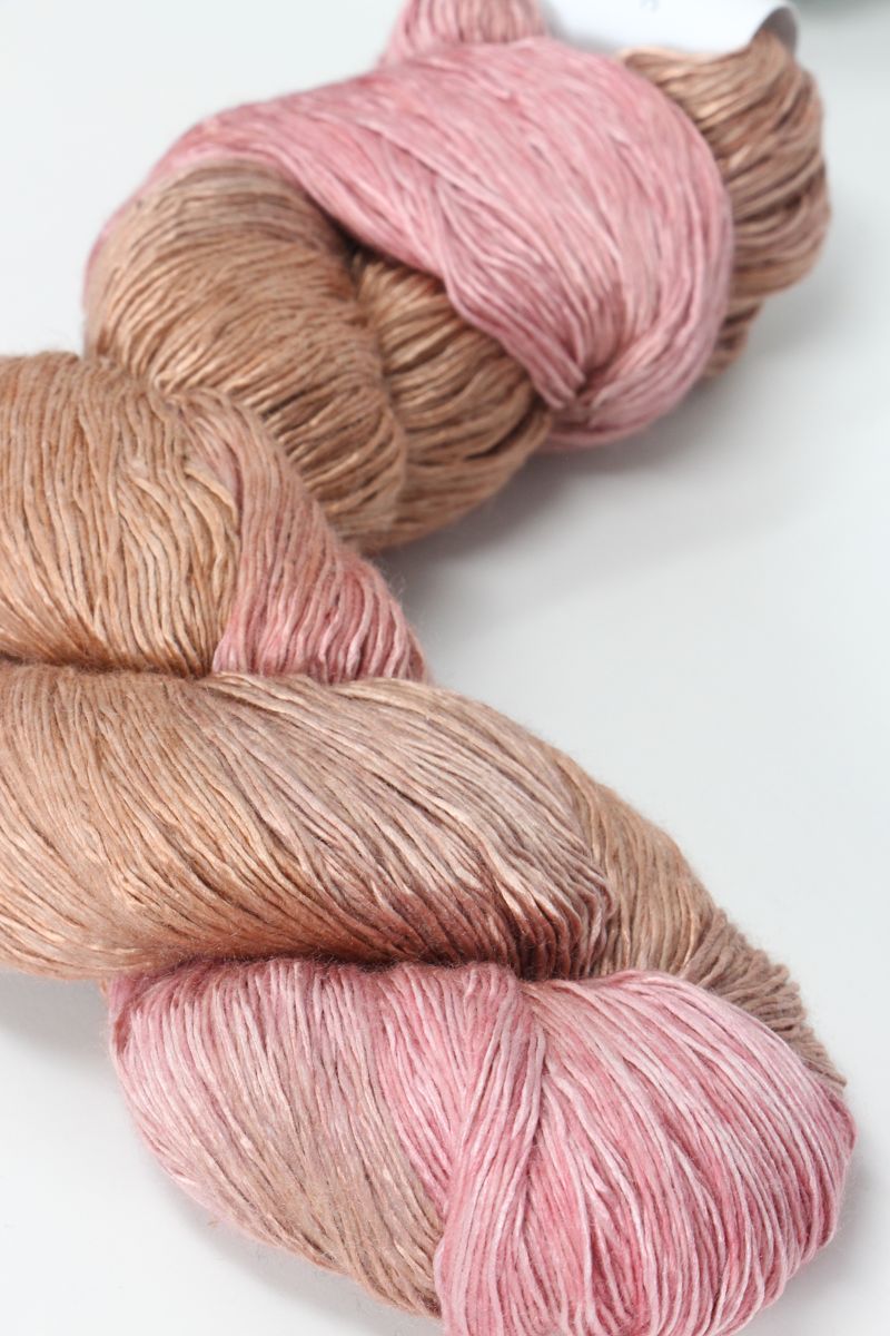 Artyarns Ensemble Light cosmic-colored yarn from the H Series, showcasing vibrant, textured yarn fibers for knitting or crochet projects.
