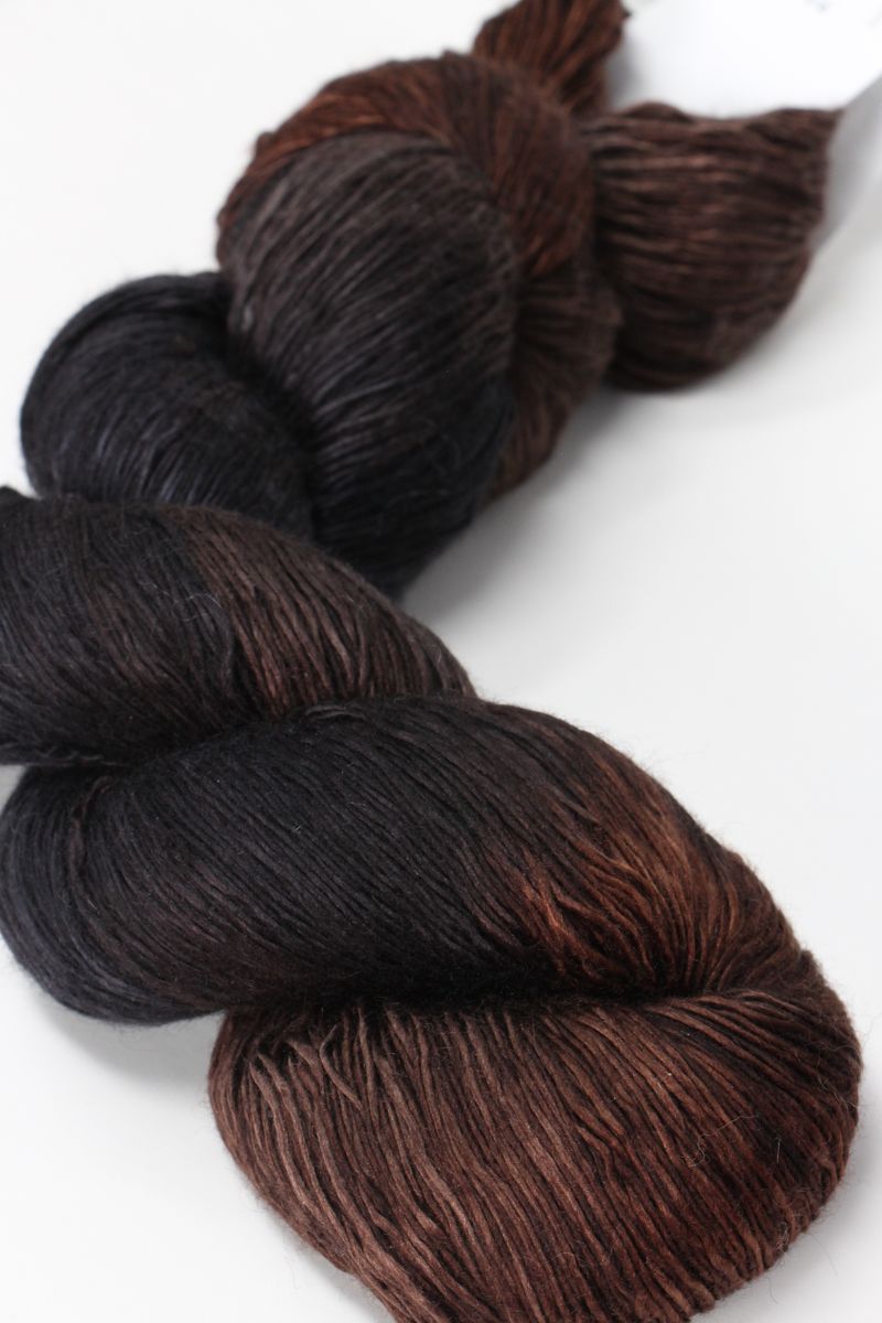 Artyarns Ensemble Light cosmic-colored yarn from the H Series, showcasing vibrant, soft fiber in a close-up shot.