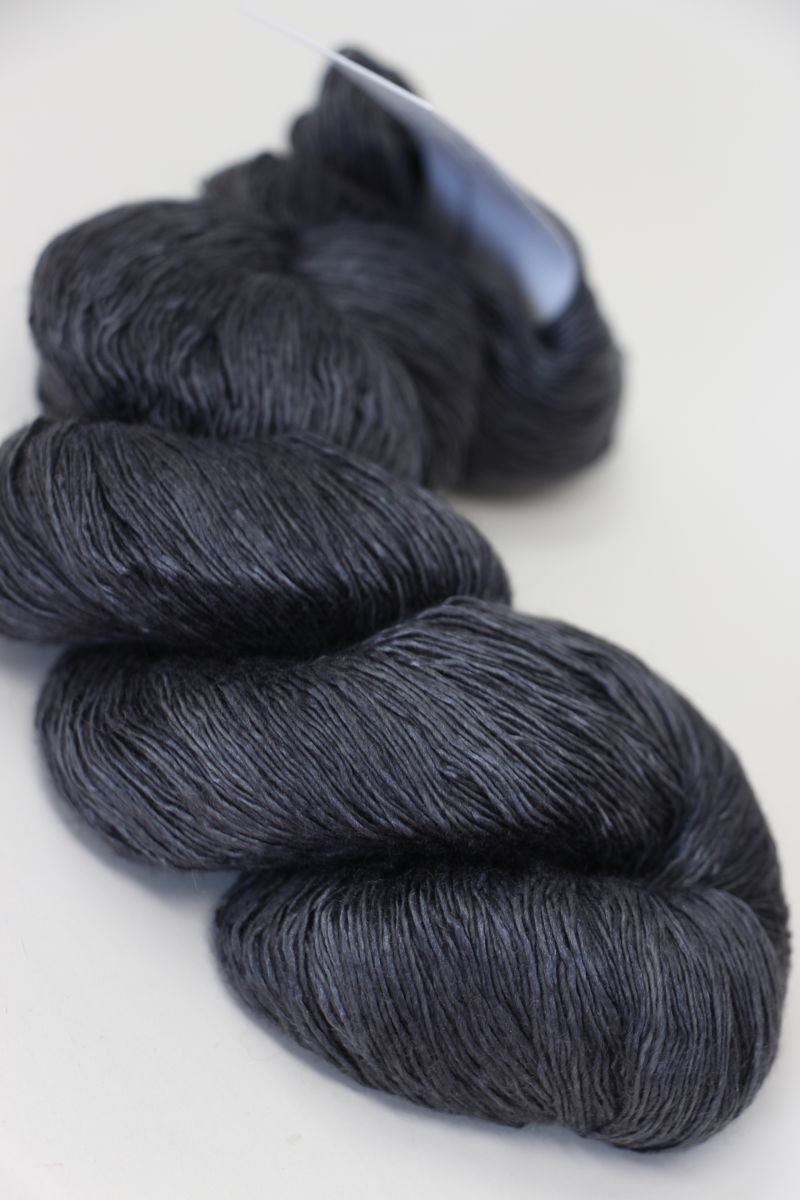 Artyarns Ensemble Light cashmere yarn in F Series colors, showing a close-up of the soft, multicolored skein with vibrant hues.