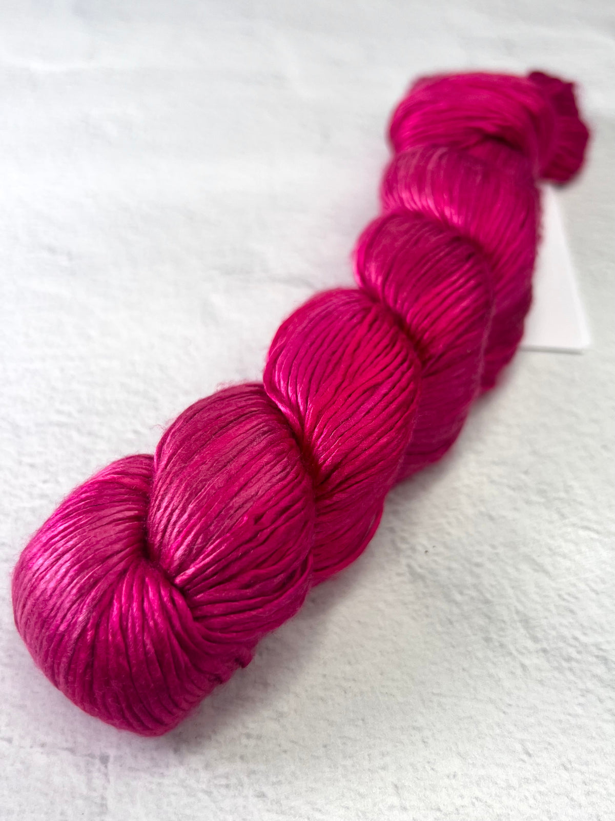 Close-up of Artyarns Regal Silk Yarn H Series in vibrant highlights, showcasing the luxurious silk texture and colorful fiber strands.