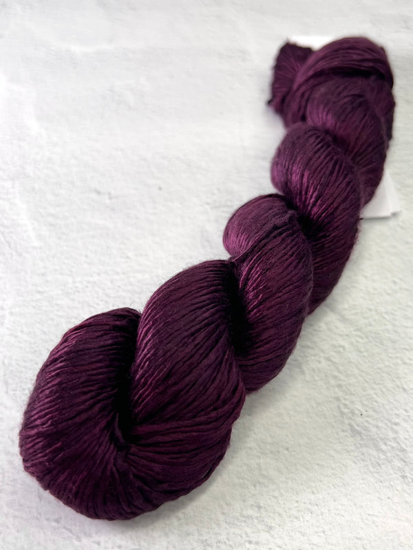 Close-up of Artyarns Regal Silk Yarn H Series showing vibrant silk fibers with subtle highlights and rich color details.
