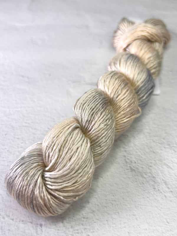 Close-up of Artyarns Regal Silk Yarn H Series in rich, vibrant silk fibers with subtle highlights and a smooth texture.