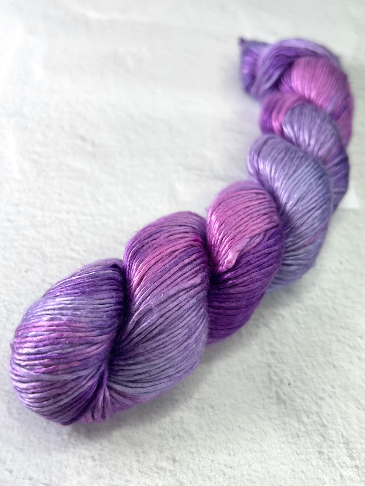Artyarns Regal Silk Yarn H Series in vibrant, glossy silk highlights, showcasing smooth, lustrous fiber for luxurious knitting or crochet projects.