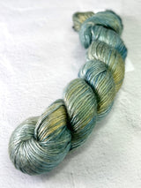 Close-up of Artyarns Regal Silk Yarn H Series in vibrant, silky fibers with rich color highlights and smooth texture.