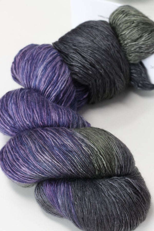 Artyarns Ensemble Light yarn in Cosmic Colors from the H Series, showing vibrant, multicolored skein suitable for knitting or crochet projects.