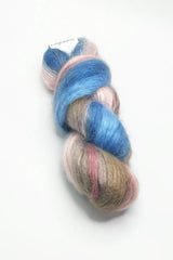 Artyarns Merino Cloud yarn from Inspiration Club March 2024 in Desert Lagoons color, showcasing soft, colorful wool yarn for knitting or crochet.