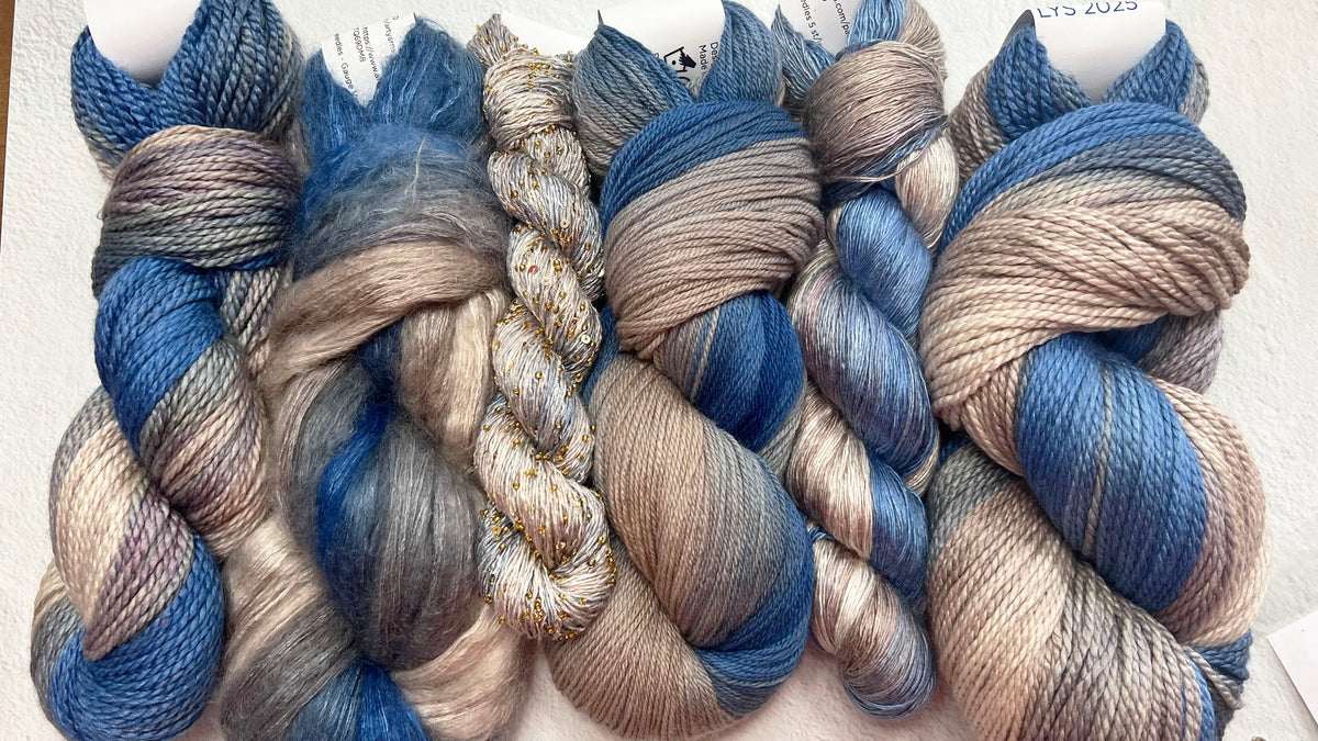 Artyarns Merino Cloud yarn in soft, pastel shades, designed for knitting or crochet projects, celebrating Local Yarn Store Day 2025.
