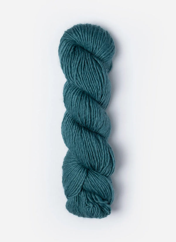 Blue Sky Fibers Suri Merino alpaca and merino yarn in soft blue color, showcasing the smooth, spun fiber strands.
