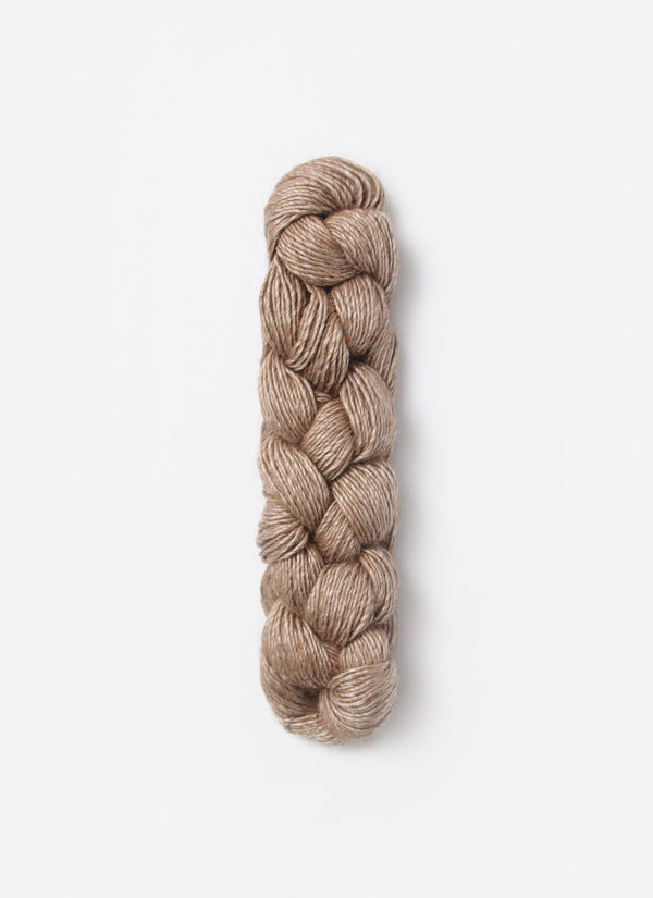 Blue Sky Fibers Metalico alpaca yarn in a soft blue shade, showcasing the textured, metallic-finished fiber.