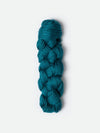 Blue Sky Fibers Metalico alpaca yarn in a soft, natural fiber with a metallic sheen, showcasing its luxurious texture.