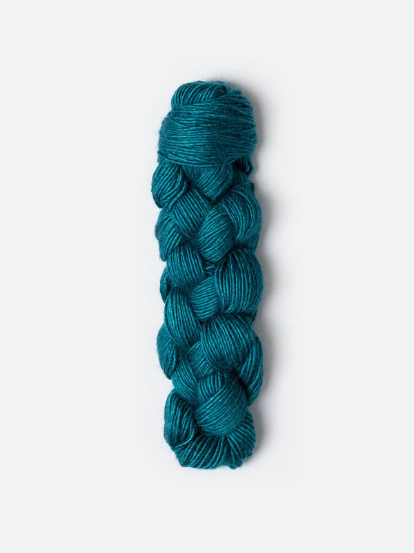 Blue Sky Fibers Metalico alpaca yarn in a soft, natural fiber with a metallic sheen, showcasing its luxurious texture.