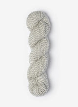 Blue Sky Fibers Baby Alpaca Sport Weight Melange yarn, soft and textured alpaca wool in blue and gray tones.