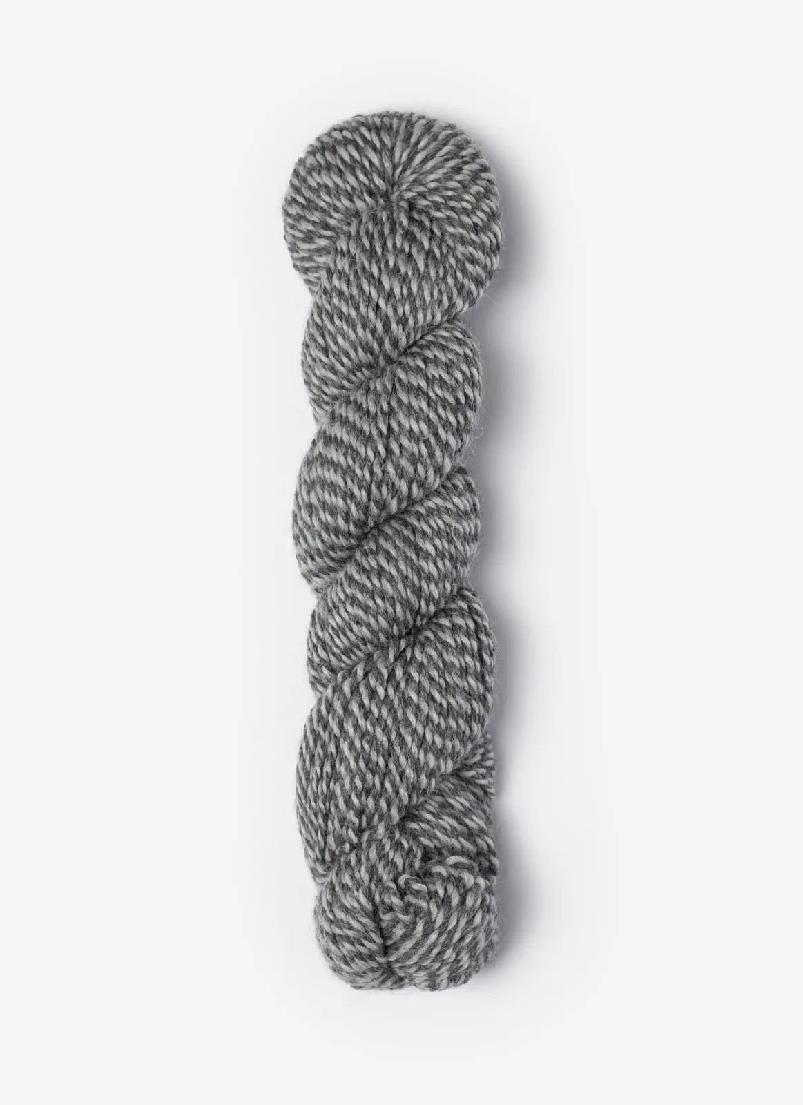 Blue Sky Fibers Baby Alpaca Sport Weight Melange alpaca yarn in soft blue and cream tones, showcasing the textured yarn strands.