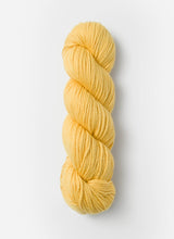 Blue Sky Fibers Sweater Worsted Superwash knitting yarn in soft wool and cotton blend, shown in a skein with vibrant blue color.