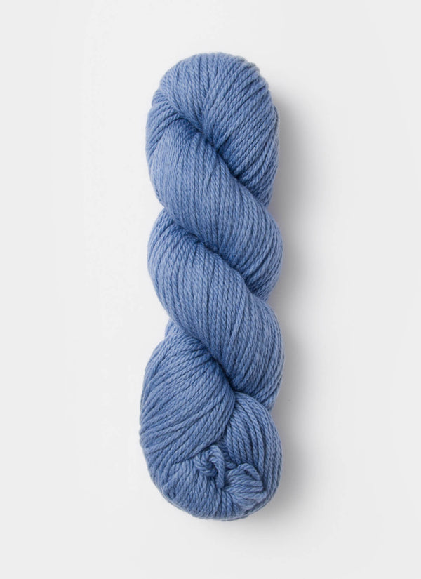 Blue Sky Fibers Sweater Worsted Superwash knitting yarn in soft blue, featuring wool and cotton blend for cozy knitting projects.