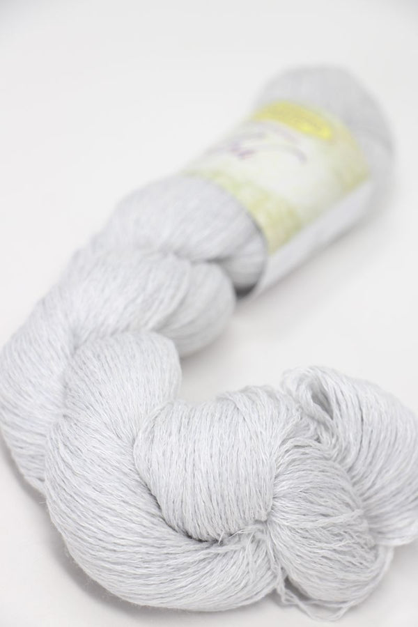 Jade Sapphire Sylph linen and cashmere yarn in soft, natural fibers, showcasing a close-up of the textured, lightweight yarn.