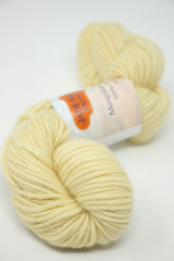 Jade Sapphire 8 Ply Cashmere yarn in a soft jasmine color, showcasing luxurious cashmere fibers and texture.