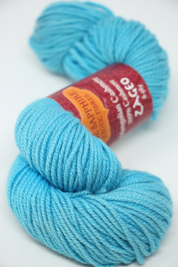 Jade Sapphire Zageo 6 Ply Cashmere yarn in vibrant Curacao color, showcasing soft, luxurious cashmere fibers.