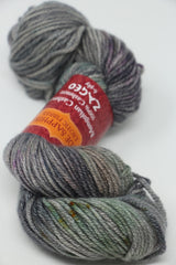 Jade Sapphire Zageo 6 Ply Cashmere yarn in Earth Gray color, showcasing soft, luxurious cashmere fibers on the skein.