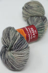 Jade Sapphire Zageo 6 Ply Cashmere yarn in Earth White, showcasing soft, luxurious cashmere fibers on a spool.