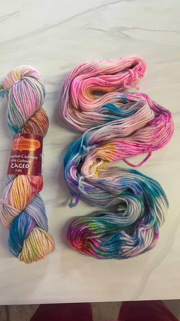Jade Sapphire Cashmere Zageo 6 Ply Cashmere Yarn in soft, luxurious light green color, neatly wound with a smooth texture.