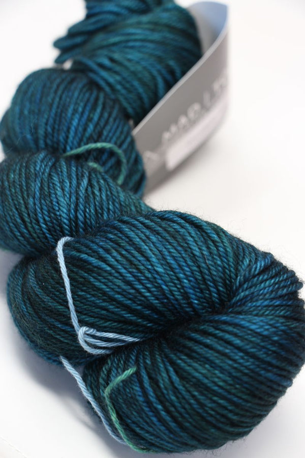 MadelineTosh Vintage Merino Wool Yarn in Cousteau colorway, soft and textured yarn for knitting or crochet projects.