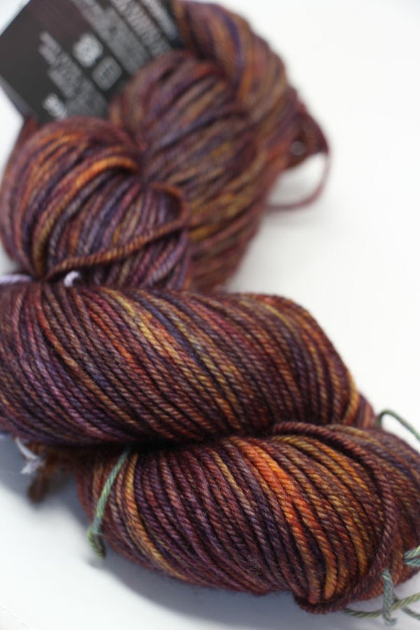 MadelineTosh Vintage Merino Wool Yarn in Firewood color, soft and textured yarn for knitting or crochet projects.