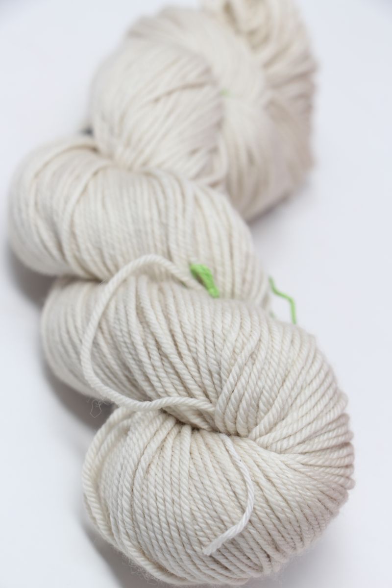 Madeline Tosh Vintage Merino Wool Yarn in paper color, soft and textured, perfect for knitting or crochet projects.