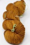 MadelineTosh Vintage Merino Wool Yarn in Glazed Pecan color, soft and textured for knitting or crochet projects.