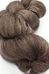 Madeline Tosh vintage merino wool yarn in Pecan Hull color, soft and textured for knitting or crochet projects.