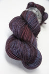 Soft Coalseam colored Madelinetosh Tosh DK yarn ball, showcasing vibrant wool yarn in a cozy, natural fiber texture.