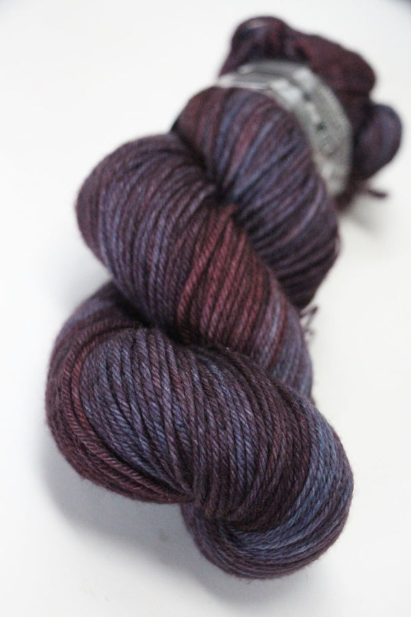 Soft Coalseam colored Madelinetosh Tosh DK yarn ball, showcasing vibrant wool yarn in a cozy, natural fiber texture.