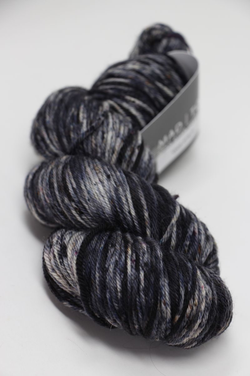 Madelinetosh Tosh DK yarn in the Void color, soft and versatile fingering weight wool blend for knitting and crochet projects.