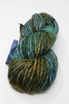 Malabrigo Rasta merino wool yarn in Draco color, thick and soft for knitting or crochet projects.