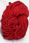 Malabrigo Rasta merino wool yarn in Ravelry Red, soft and vibrant yarn for knitting and crochet projects.