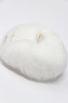 White Rowan Kidsilk Haze yarn ball, soft and delicate, showcasing the fine, lightweight fibers of Rowan's knitting yarn.