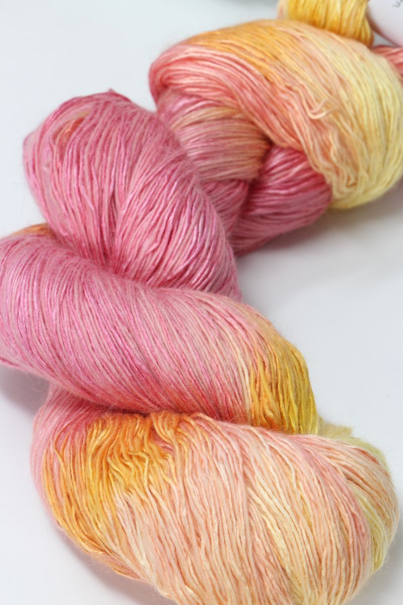 Artyarns Ensemble Light yarn in Cosmic Colors, H Series, 600 Series, showcasing vibrant, shimmering multicolor yarn for knitting or crochet