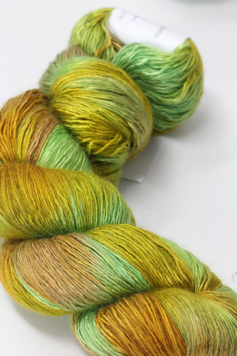 Artyarns Ensemble Light yarn in Cosmic Colors from the H Series, showcasing vibrant, multicolored skein of high-quality knitting yarn.
