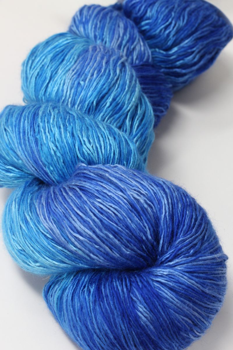 Artyarns Ensemble Light yarn in Cosmic Colors from the H Series, showcasing vibrant, multicolored yarn strands.