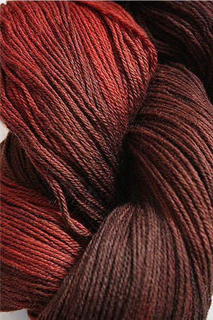 Close-up of Artyarns Merino Cloud Yarn in H Series, showing soft, multicolored merino wool fibers and delicate yarn texture.
