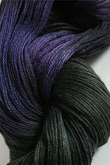Close-up of Artyarns Merino Cloud Yarn in soft, fluffy strands showcasing the luxurious texture and subtle color variations.