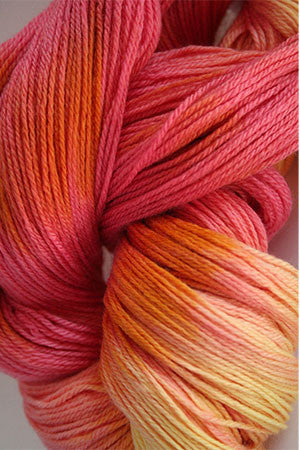 Close-up of Artyarns Merino Cloud Yarn in H Series, showing soft, fuzzy wool fibers in a natural cream color.