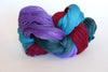 Soft Artyarns Merino Cloud Yarn in H Series, showcasing its luxurious, fluffy texture and rich color.