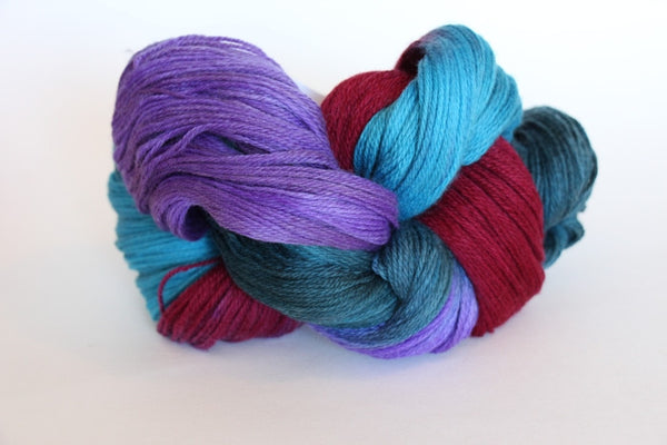 Soft Artyarns Merino Cloud Yarn in H Series, showcasing its luxurious, fluffy texture and rich color.