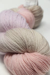 Artyarns Merino Cloud Yarn in H Series, soft, variegated wool yarn with a plush texture, displayed in a close-up shot.