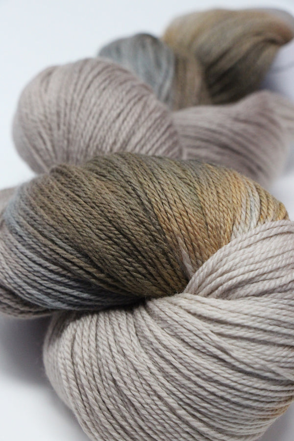 Soft close-up of Artyarns Merino Cloud Yarn in H Series, showcasing its lightweight, luxurious merino wool texture and color.