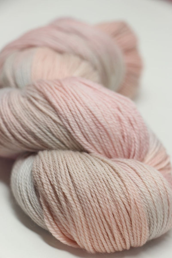 Soft Artyarns Merino Cloud Yarn (H Series) in a gentle, plush fiber with subtle color variations, perfect for cozy knitting projects.