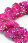 Beaded silk and sequins yarn from Artyarns' Beaded Silk & Sequins Light series, featuring shiny beads and intricate detailing.